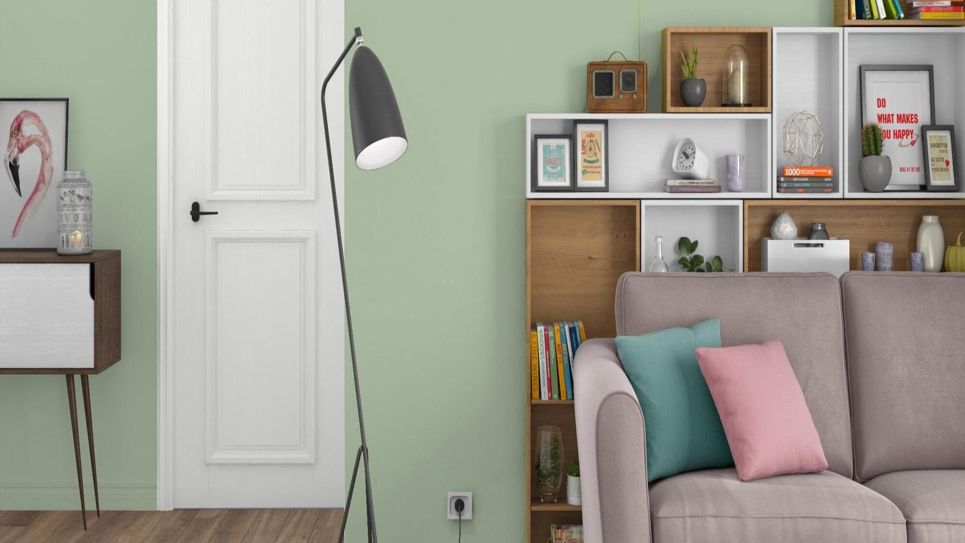 pareja aplicando pintura ecológica verde en salón luminoso